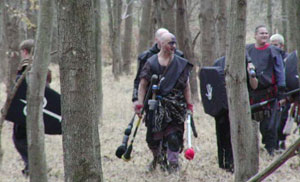 Uruk-hai hunting at a woods battle